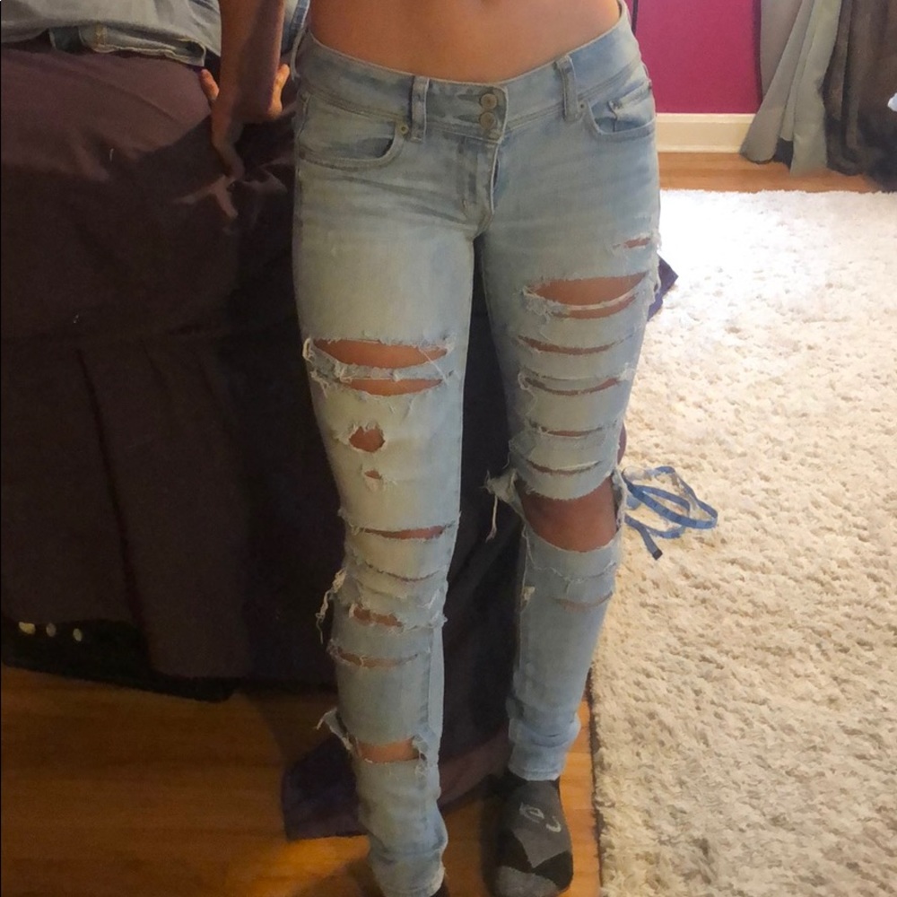 Super Distressed American eagle light wash jeans